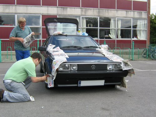 Masking up the car begins